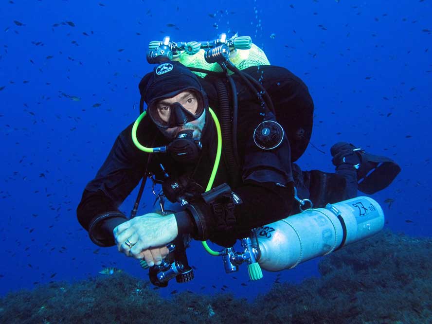 Technical Diver hovering over reef in Gozo, Malta